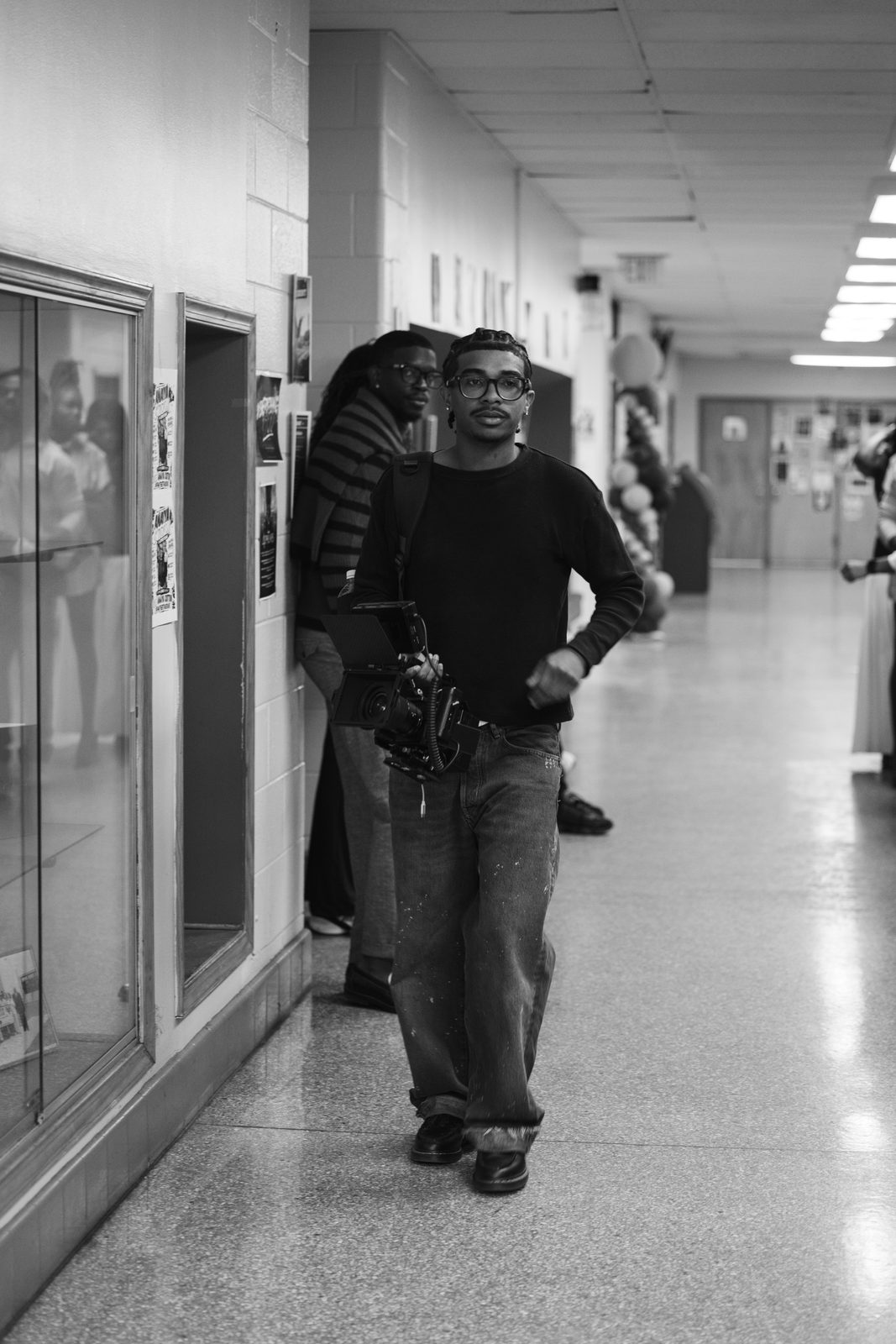 Bryce Visionz walking with camera rig at a fashion show